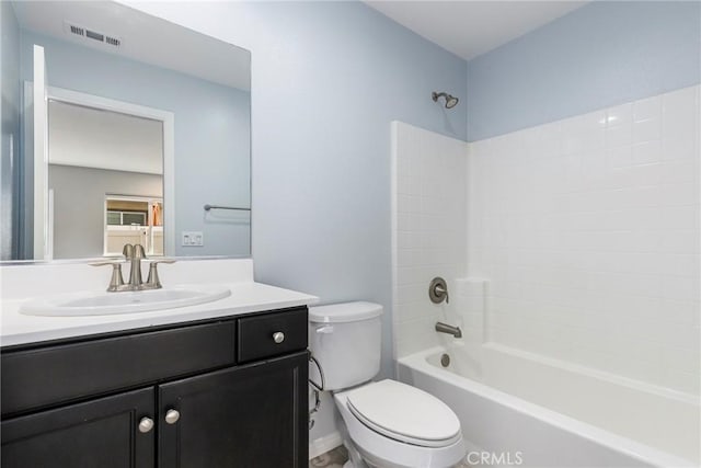 full bathroom featuring vanity, shower / bathtub combination, and toilet