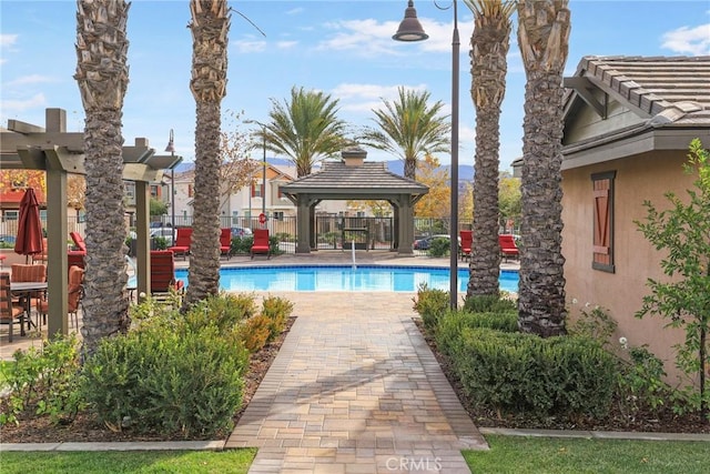 view of swimming pool with a gazebo