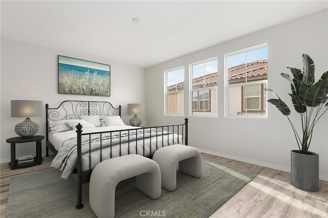 bedroom featuring light hardwood / wood-style floors