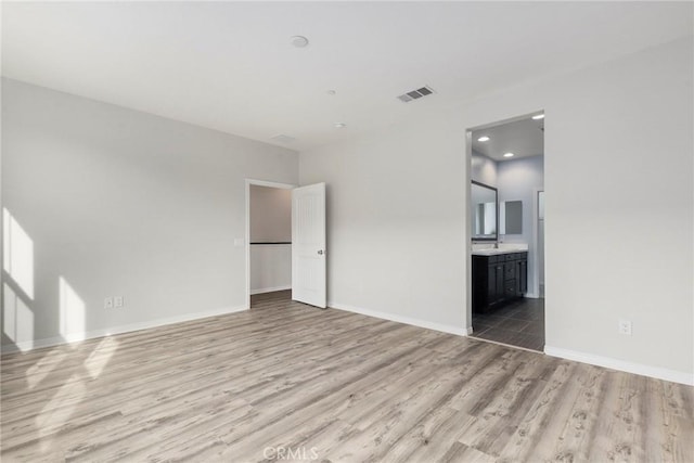 empty room featuring light wood-type flooring