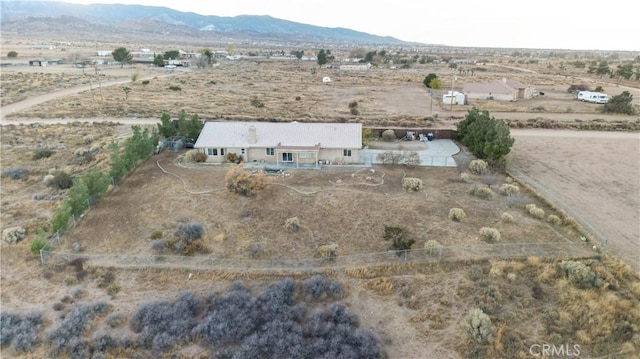 drone / aerial view featuring a mountain view