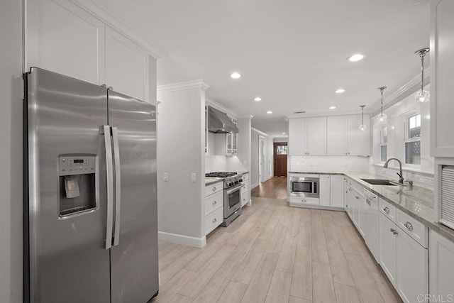 kitchen with white cabinets, stainless steel appliances, and sink