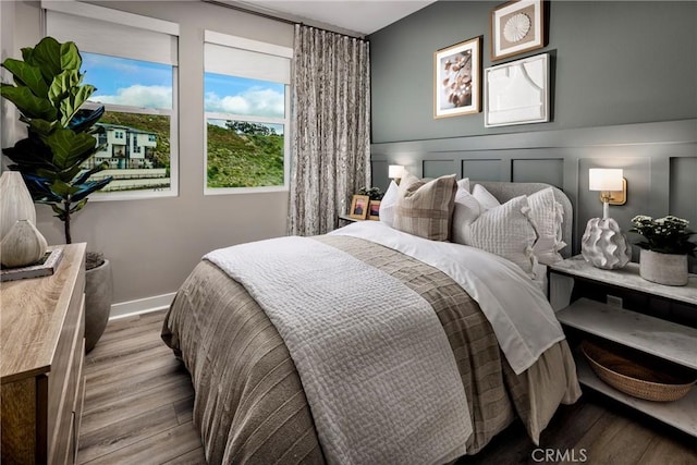 bedroom featuring light wood-type flooring