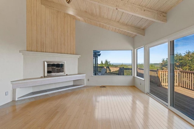 unfurnished living room with wooden ceiling, light hardwood / wood-style floors, and vaulted ceiling with beams