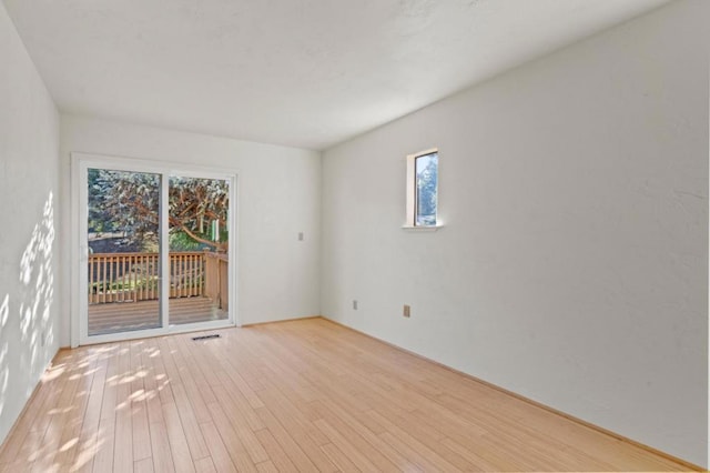 empty room featuring light hardwood / wood-style flooring