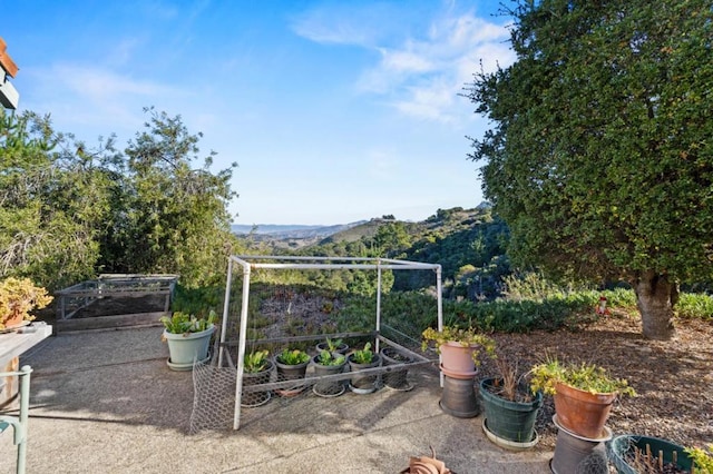 view of patio with a mountain view