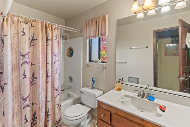 full bathroom with shower / bath combo with shower curtain, tile patterned floors, toilet, and vanity