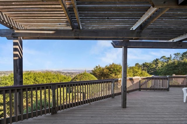 wooden terrace featuring a pergola