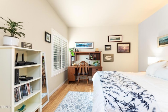 bedroom with light hardwood / wood-style flooring