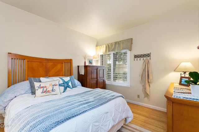 bedroom with light wood-type flooring