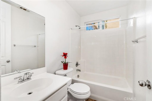 full bathroom featuring shower / bathing tub combination, vanity, and toilet