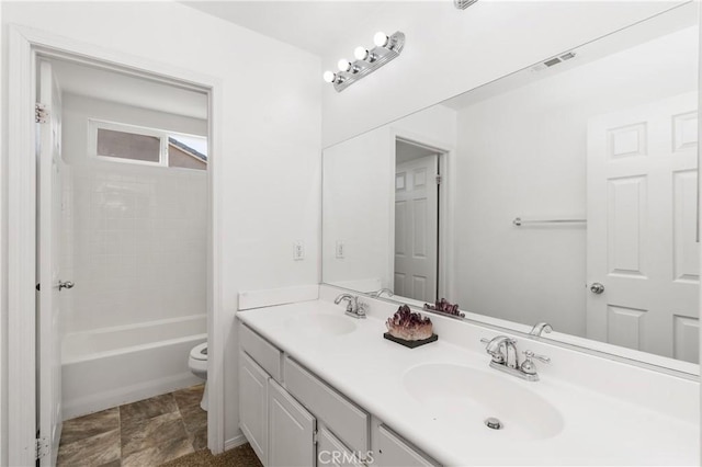 1567 Preston Dr, Perris, CA 92571 - bathroom featuring toilet, double vanity, and shower / bathtub combination