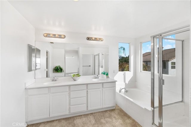 bathroom featuring vanity and plus walk in shower