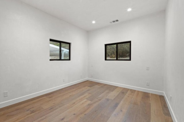 empty room featuring light hardwood / wood-style floors