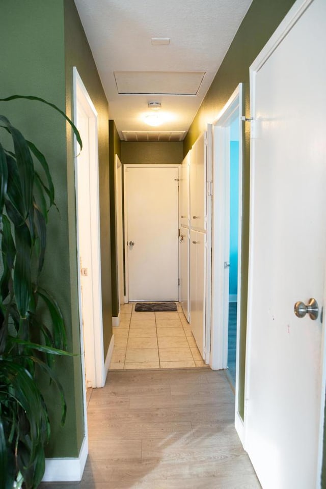 hallway featuring light hardwood / wood-style flooring