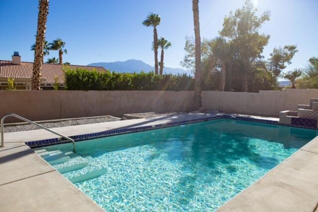 view of pool featuring a mountain view