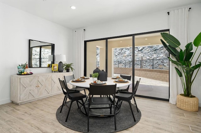 dining room featuring light wood-type flooring