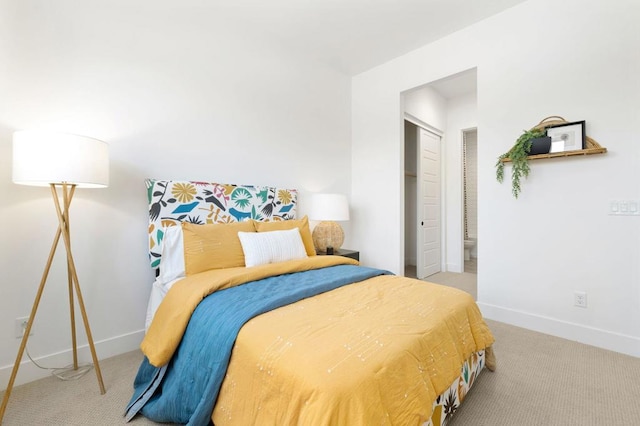 carpeted bedroom with a closet