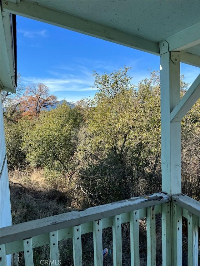 3445 Garfield Ave, Clearlake, CA 95422 - balcony featuring a wooded view