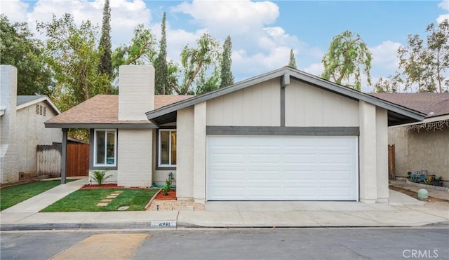 ranch-style home with a garage