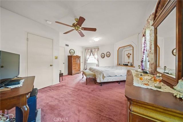 carpeted bedroom featuring ceiling fan