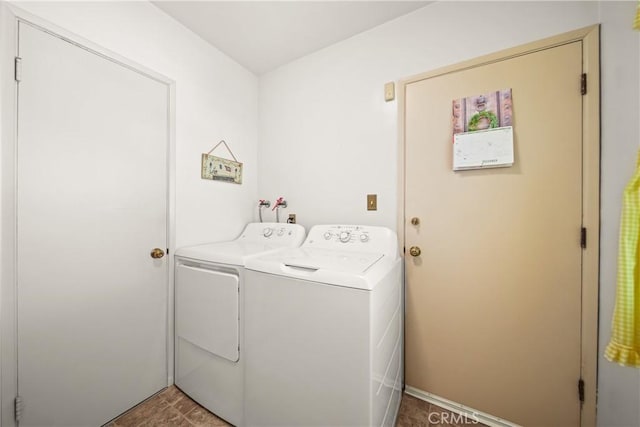 laundry area with separate washer and dryer