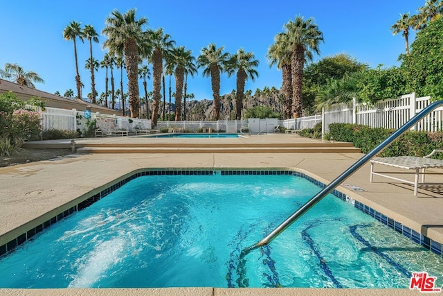 view of pool with a patio area