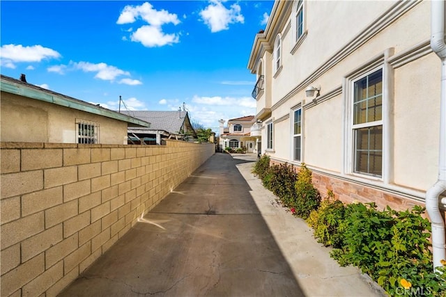 view of property exterior with a patio