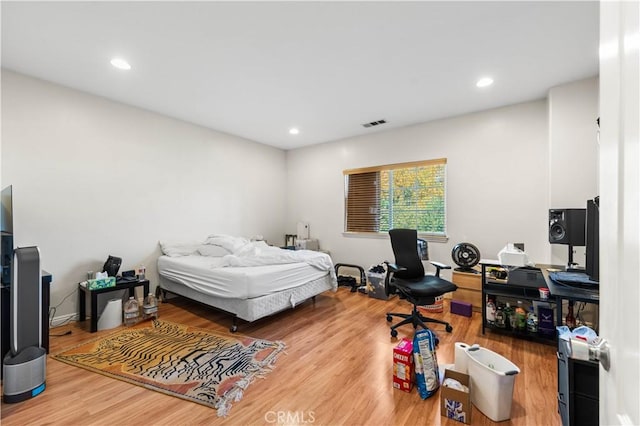 bedroom featuring wood-type flooring