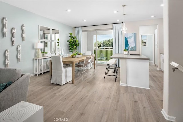 dining area featuring light hardwood / wood-style flooring