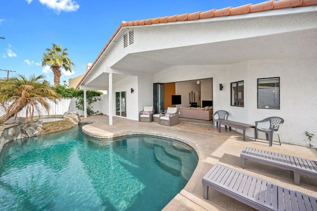 view of swimming pool featuring a patio area