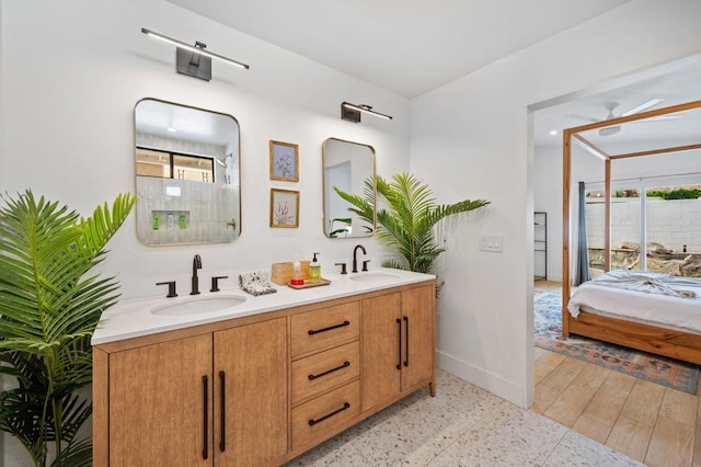 bathroom with vanity and hardwood / wood-style floors