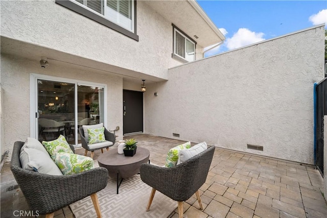 view of patio / terrace with an outdoor hangout area