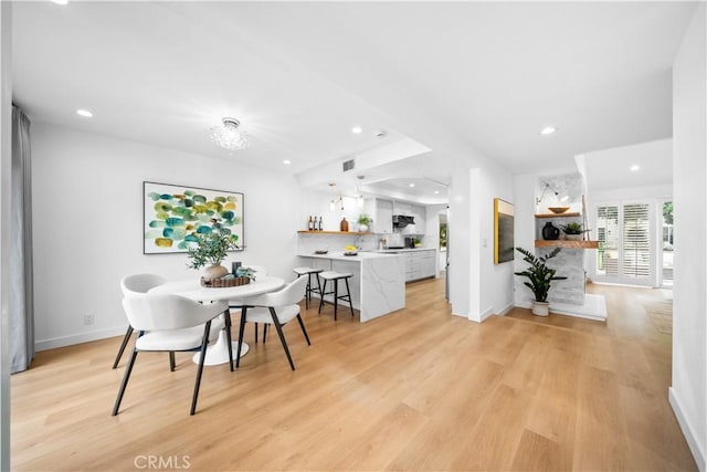 dining area featuring light hardwood / wood-style flooring