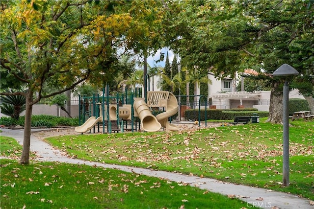 view of playground with a yard