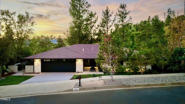 view of front of property with a garage