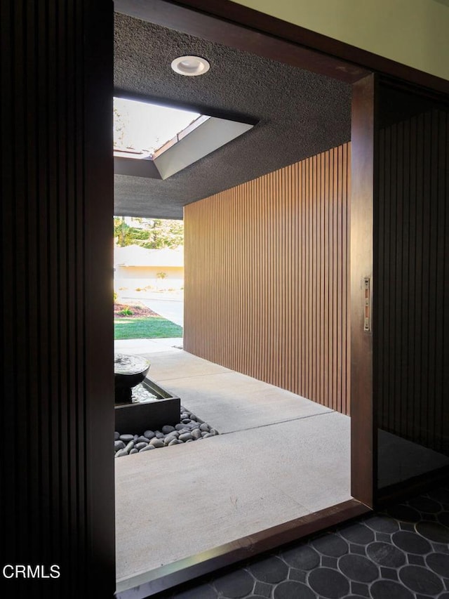 entryway with a skylight