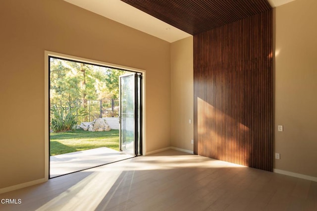 spare room featuring hardwood / wood-style floors