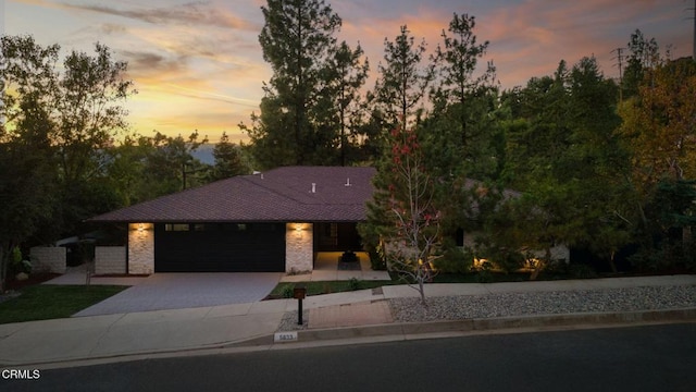 view of front of property with a garage