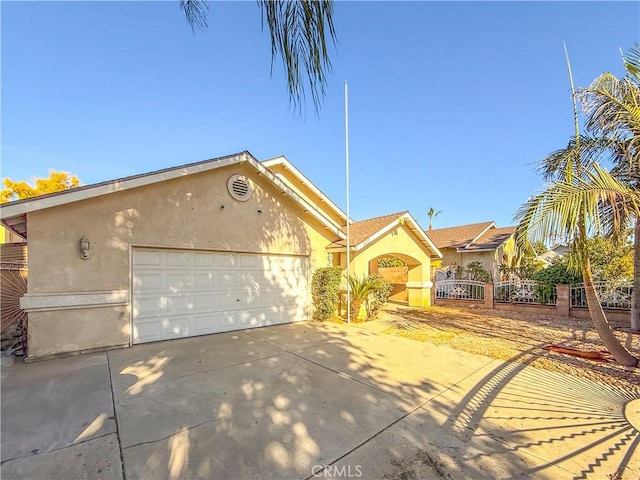 single story home with a garage