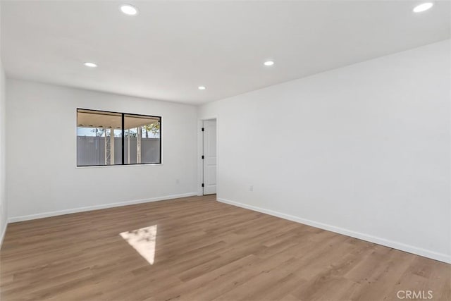 empty room featuring light hardwood / wood-style floors