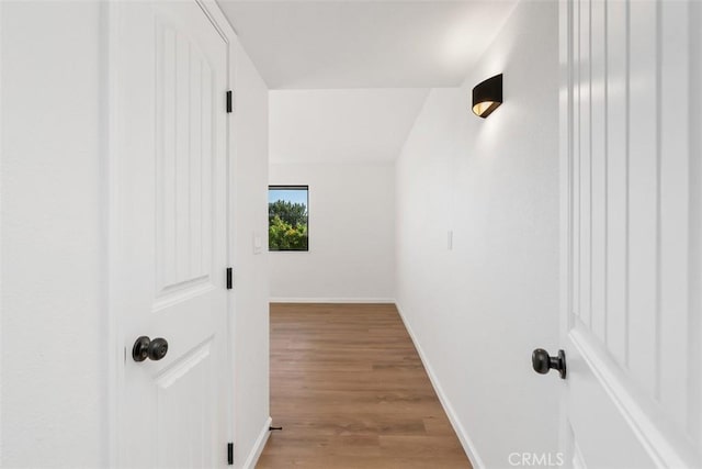 hall with light wood-type flooring