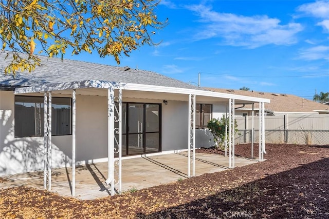 rear view of house featuring a patio area