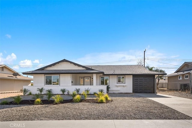 ranch-style home with a garage