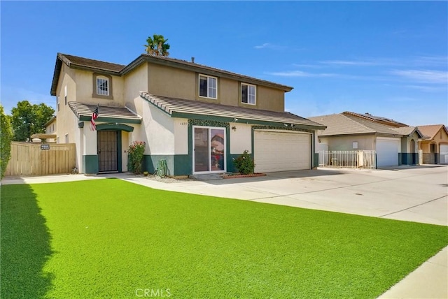 view of front property with a garage and a front lawn