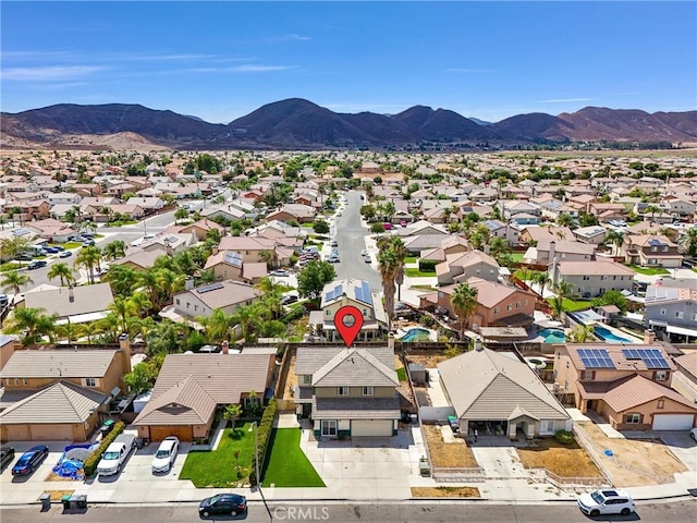 drone / aerial view featuring a mountain view