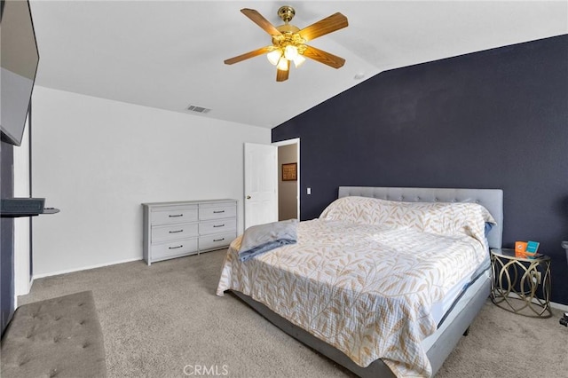 carpeted bedroom featuring ceiling fan and lofted ceiling