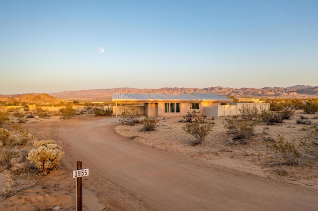 ranch-style house with a mountain view