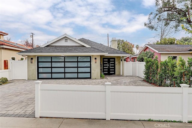 view of front of house with a garage