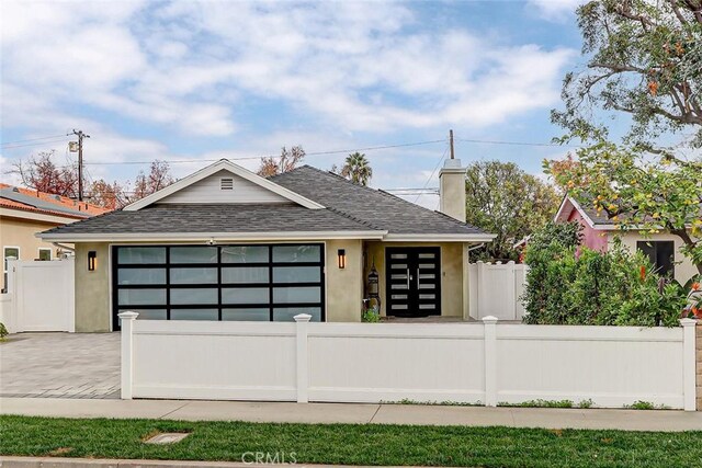 view of front of home featuring a garage